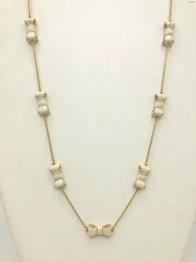 KATE SPADE Goldtone Cream Enamel Pre Loved bow Necklace