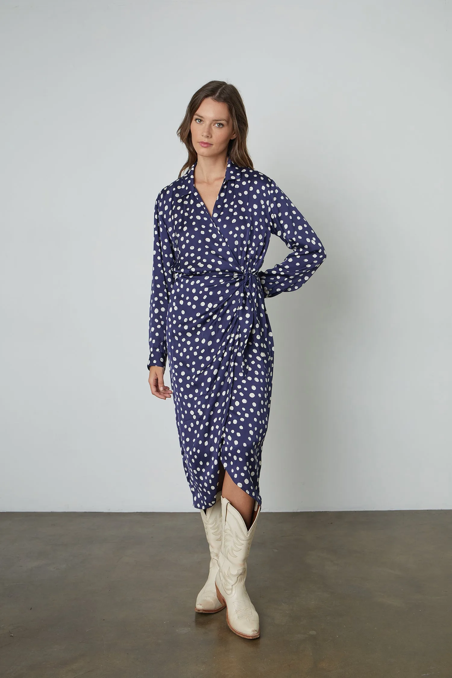 ZENDAYA POLKA DOT WRAP DRESS IN NAVY